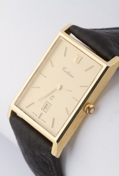 Gouden Certina horloge (quartz) aan lederen band