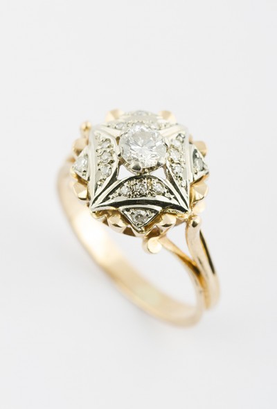 Gouden entourage ring met briljant en diamant
