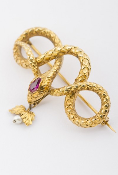 Antiek gouden slangen broche met robijn
