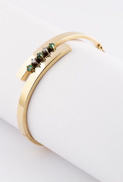 Gouden slag slaven armband met briljant en smaragd