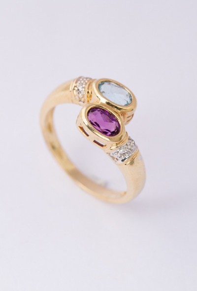 Gouden slag ring met topaas, amethist en diamanten