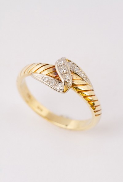 Wit/geel gouden slag ring met 9 diamanten