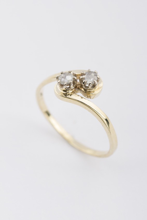 Gouden slag ring met roos diamanten