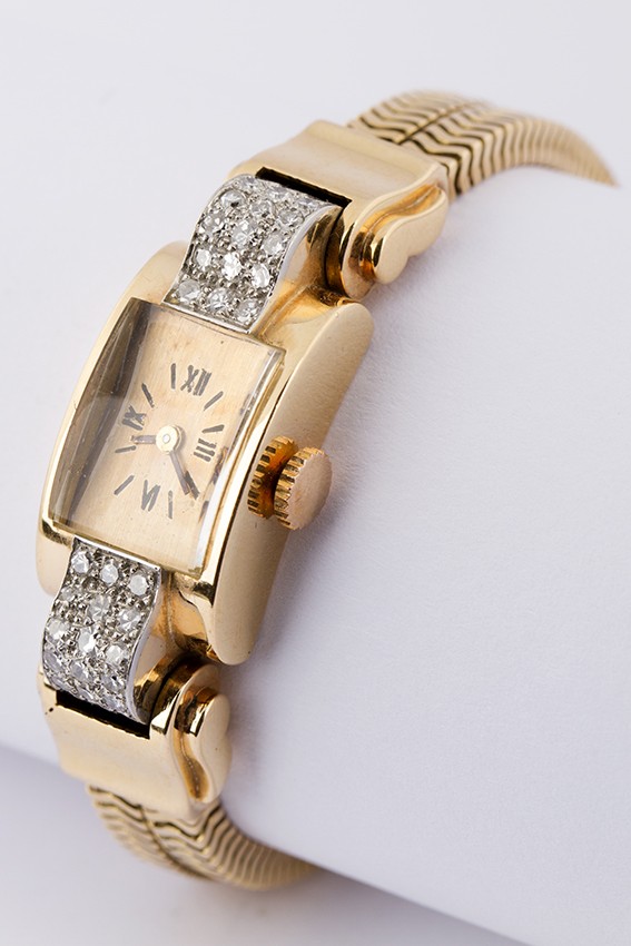 Démodé horloge met diamant