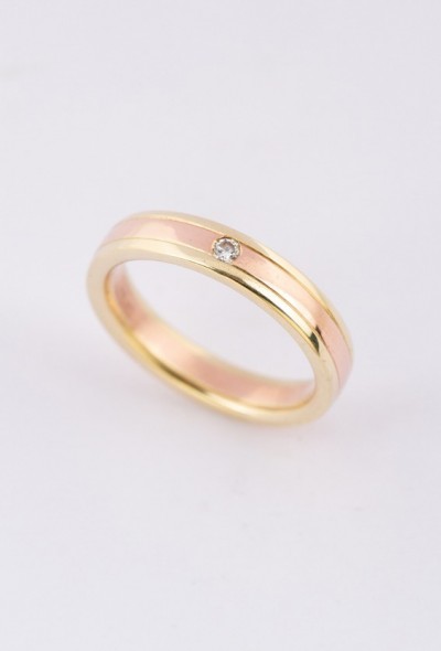 Rosé/geel gouden ring met een briljant