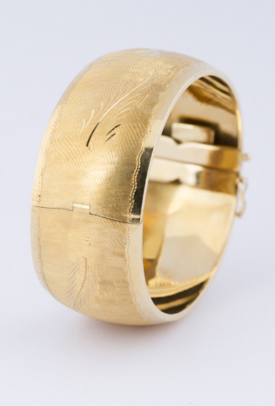 Brede gouden slavenarmband