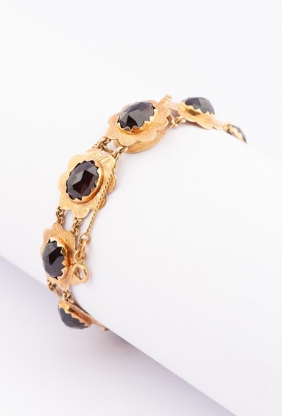 Gouden armband met granaten