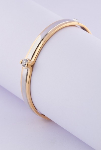 Gouden massieve slaven armband van het merk: Le Chic met een briljant