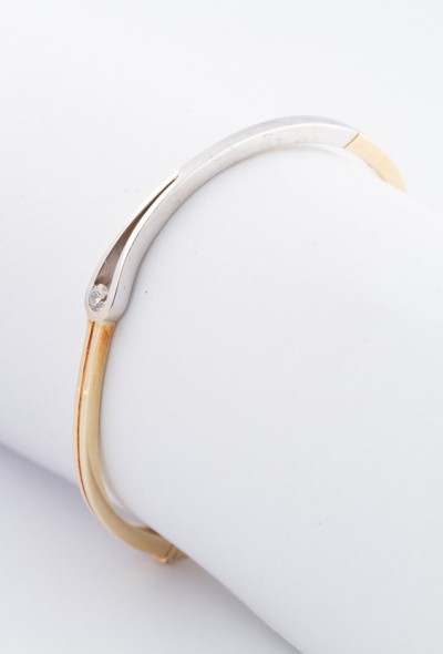 Wit/geel gouden bangle met een briljant