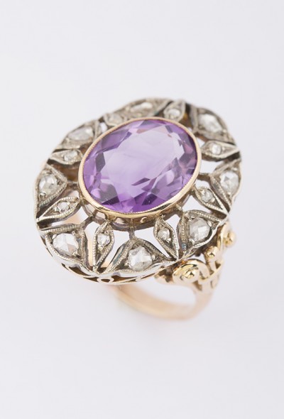 Gouden entourage ring met amethyst en diamant